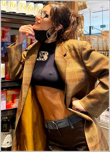 Bella Hadid bares belly button