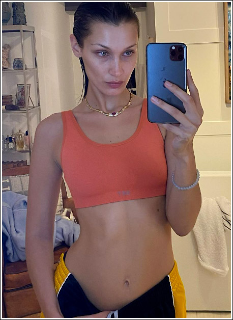Bella Hadid bares belly button