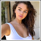 Popoholic Blog Archive Selena Gomez Busting Out Her Massive Cleavage In A Tiny Tanktop